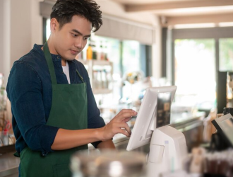Restaurant Staff taking order on POS