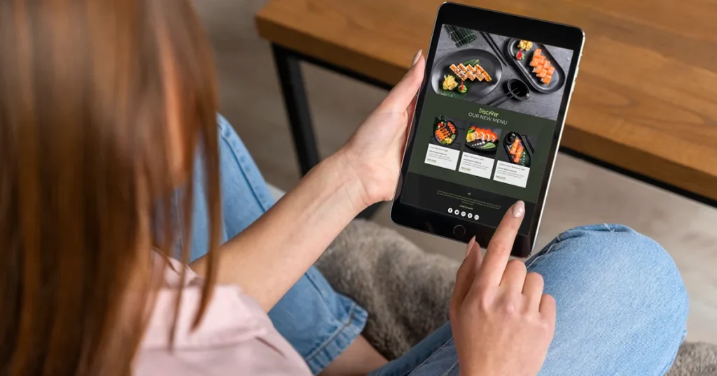 Woman ordering food at home from an app