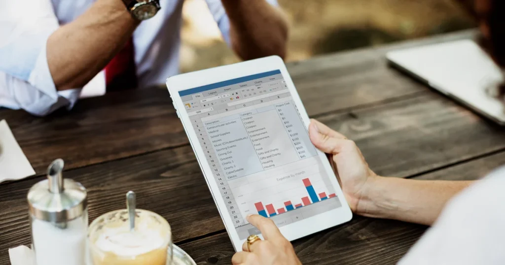 Restaurant owner analysing consumer data