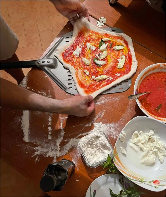 Delicious Margherita pizza with fresh basil at XYZ restaurant.