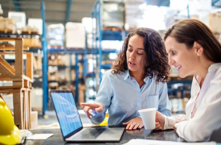 2 women checking inventory