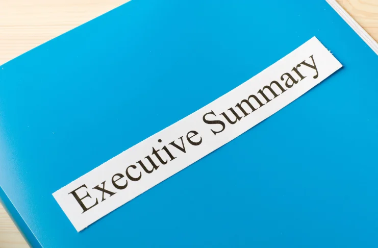 A notebook with executive summary written on it