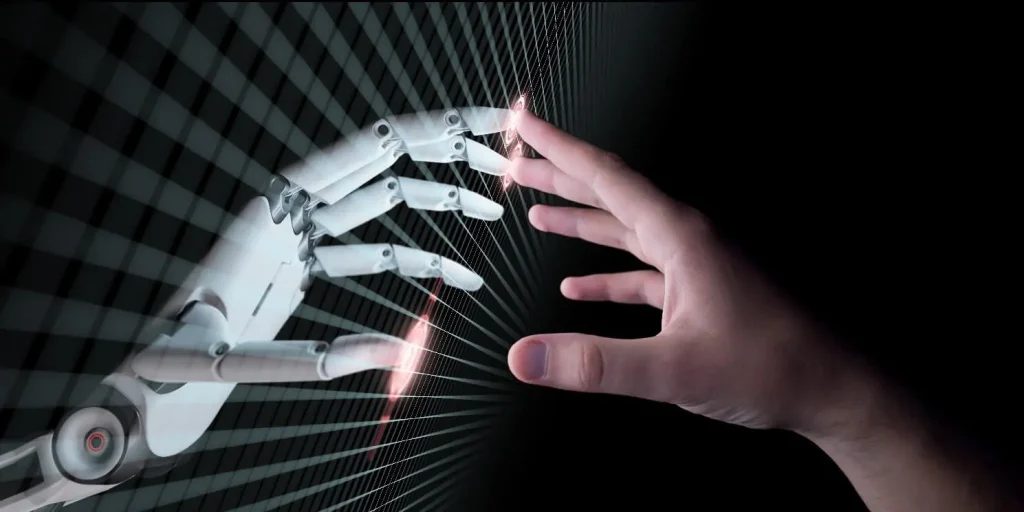 a robotic and a human hand connected