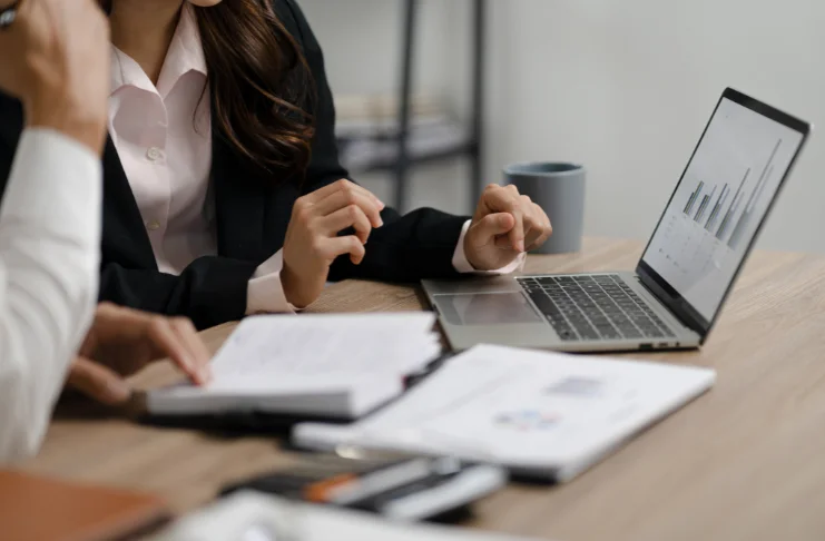 people analyzing numbers