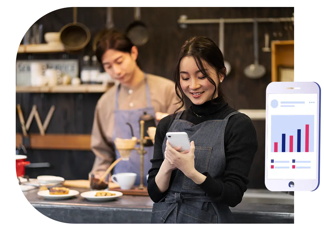 Restaurant staff using the Restroworks analytics app