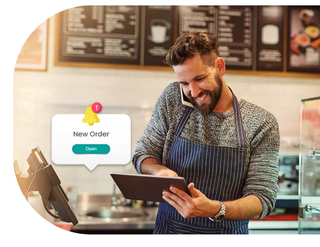 Restaurant staff using tablet ordering system