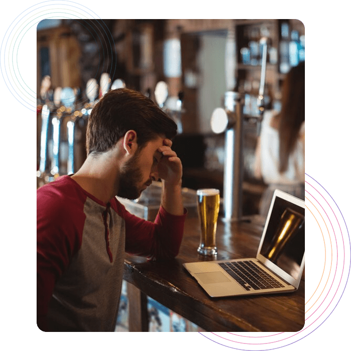 Restaurant staff pondering over their computer