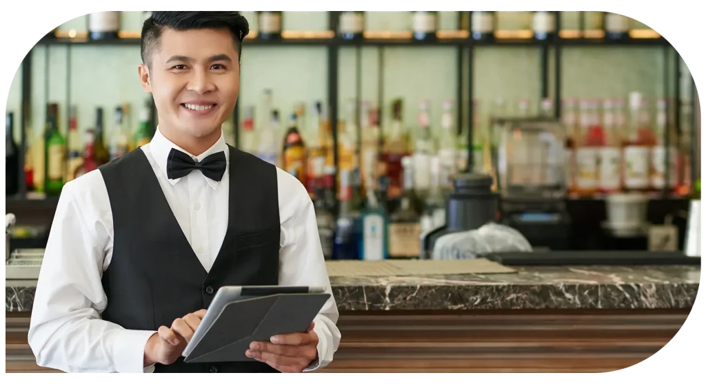 Restaurant staff using tablet ordering system