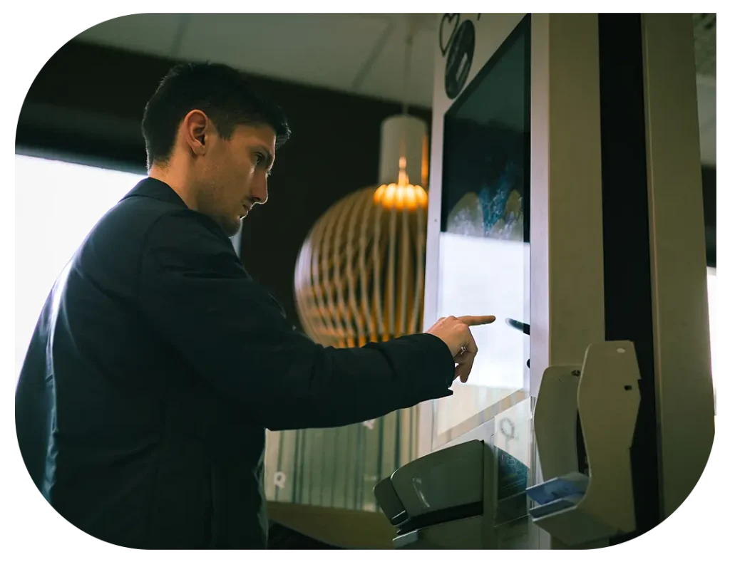 Customer using Restaurant self ordering kiosk