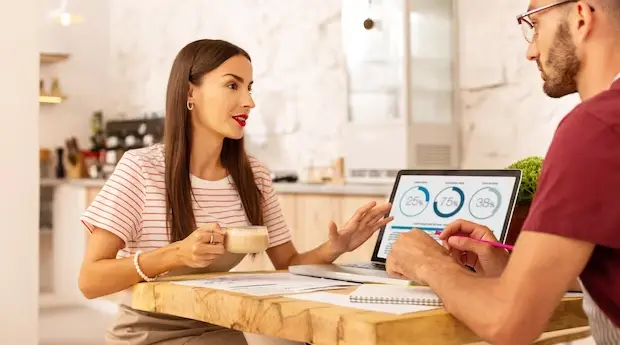 Restaurant staff discussing over the restaurant analytics application