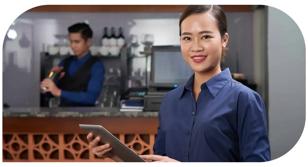 Restaurant manager using tablet ordering system