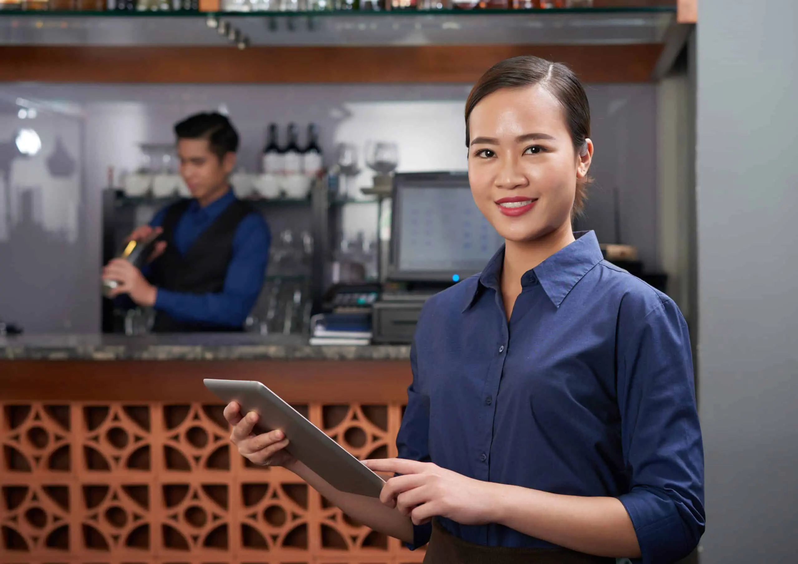 Restaurant staff using tablet ordering application