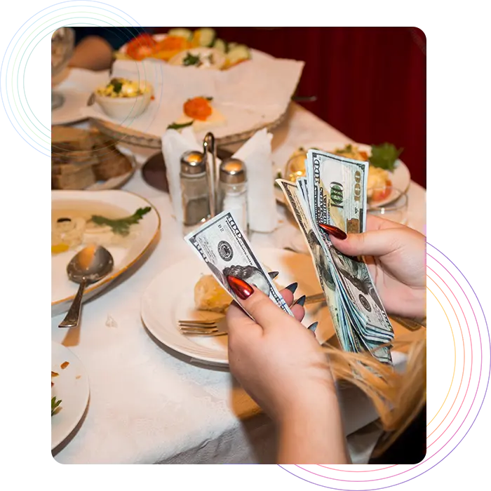 Restaurant customer paying the bill
