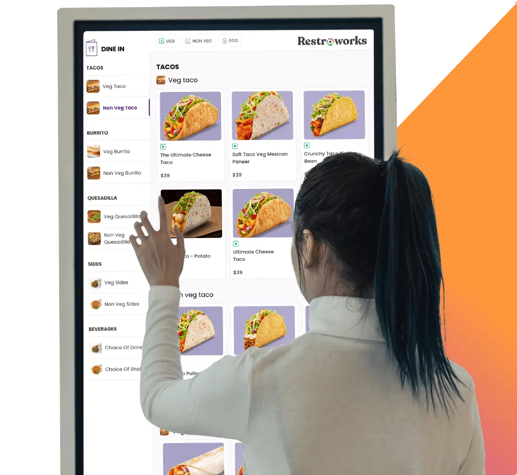 Customer using restaurant self ordering kiosk