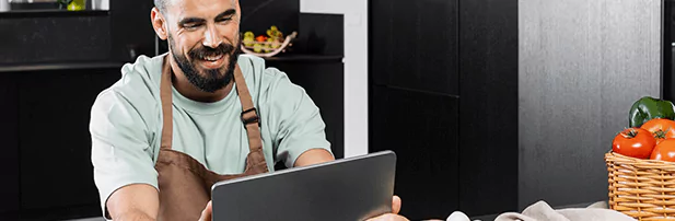 Restaurant staff using tablet ordering system
