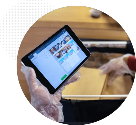 Restaurant staff using tablet ordering system