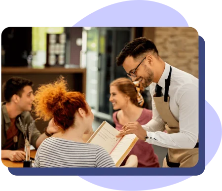 Restaurant staff taking order from customer