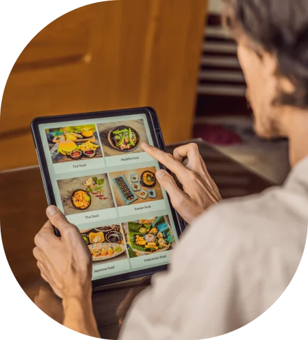 Restaurant staff using tablet ordering system