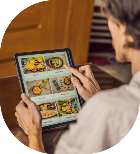 Restaurant staff using tablet ordering system
