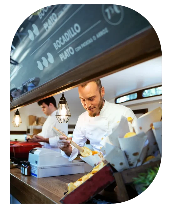 Restaurant staff preparing an order for serving